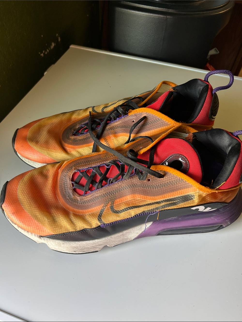 Nike Men’s Orange Red Athletic Running Shoes with Purple Accents